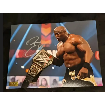 Real Deal Autographed Bobby Lashley Championship 8x10 Photo with signature and belt