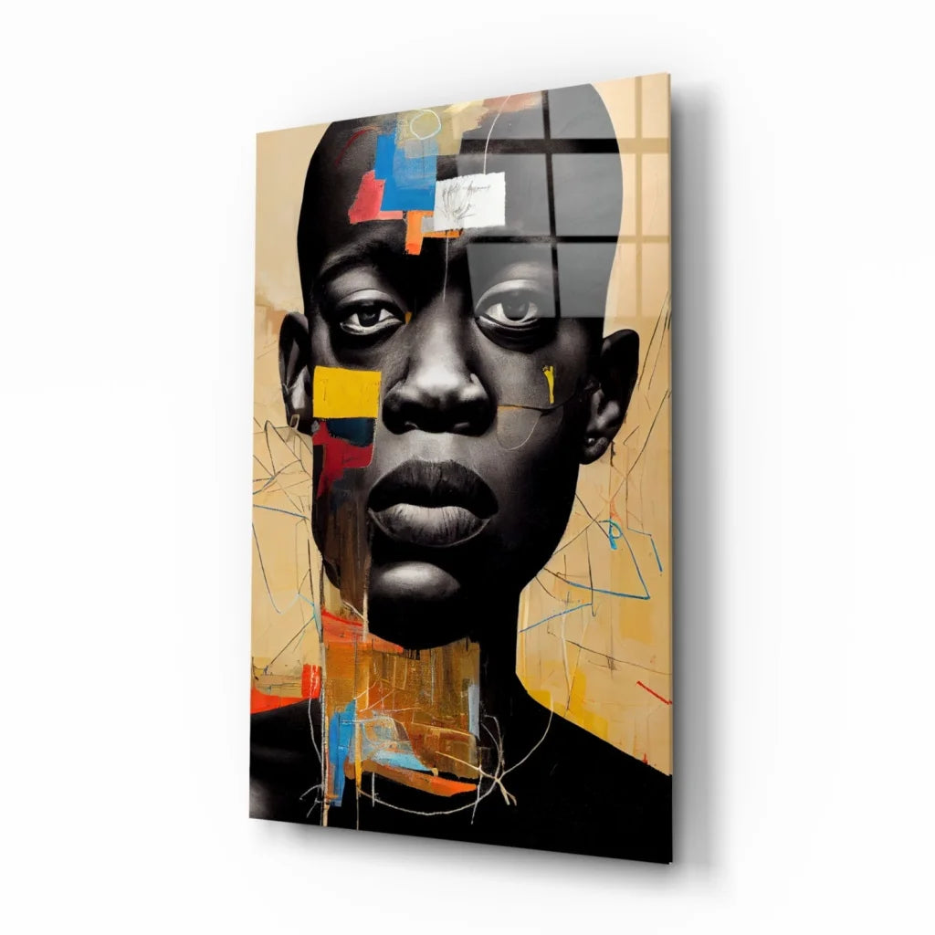 Bold geometric portrait glass wall art of black man’s face in black, beige, vibrant blue, yellow, red, orange shapes