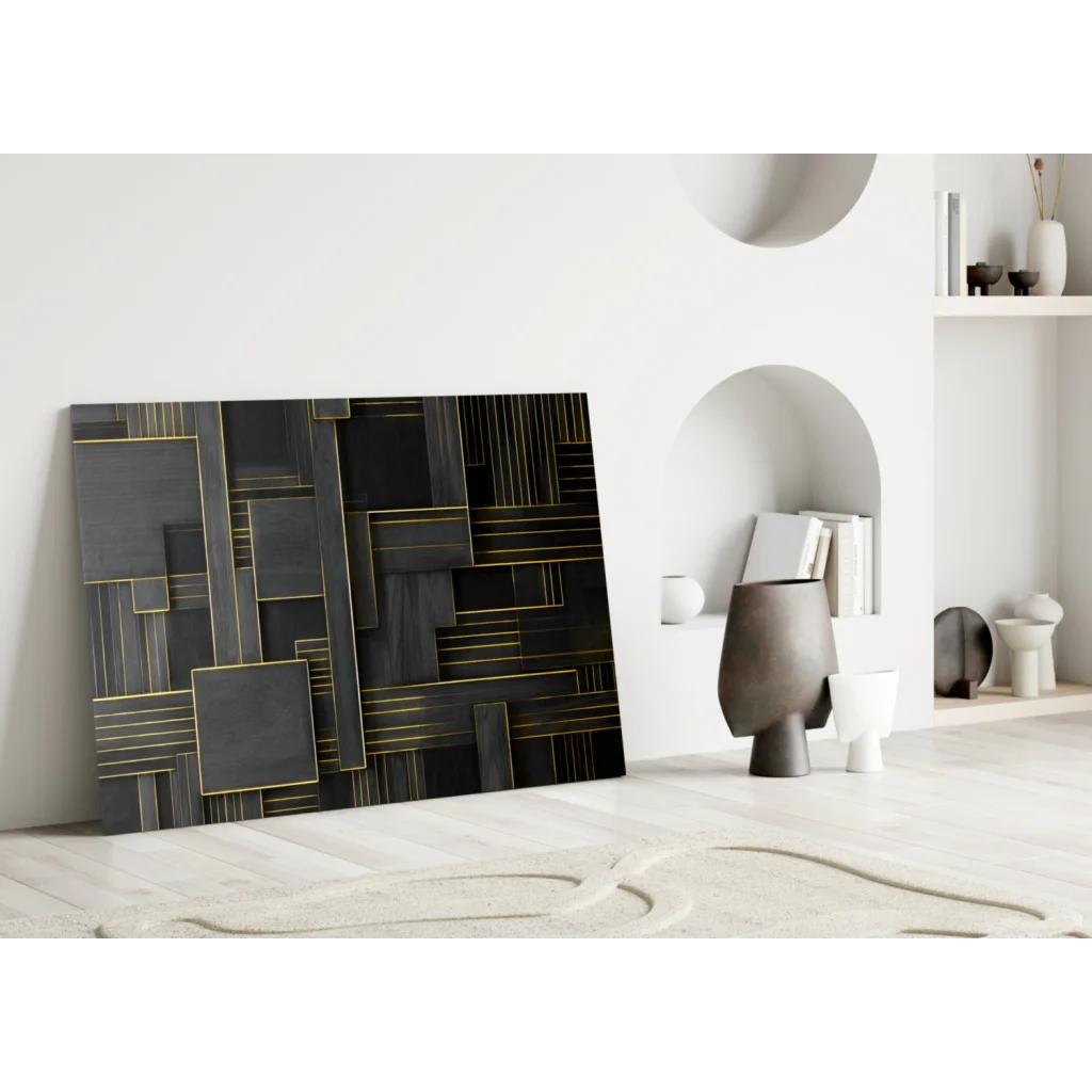 Black and gold geometric glass wall art leaning on white wall