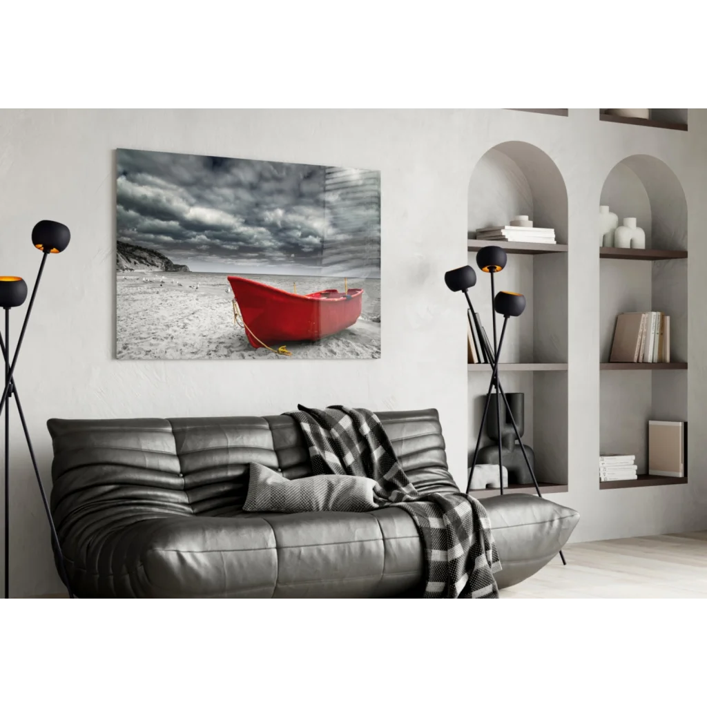 Vibrant red boat on sandy beach under dramatic monochrome skies, red boat beach storm canvas wall art