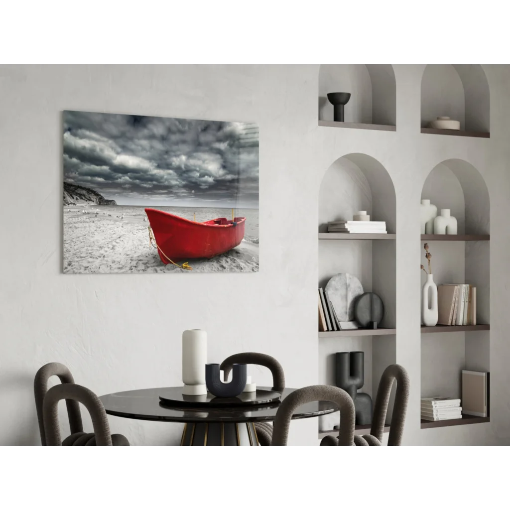 Vibrant red lifeboat on sandy beach under stormy skies wall art