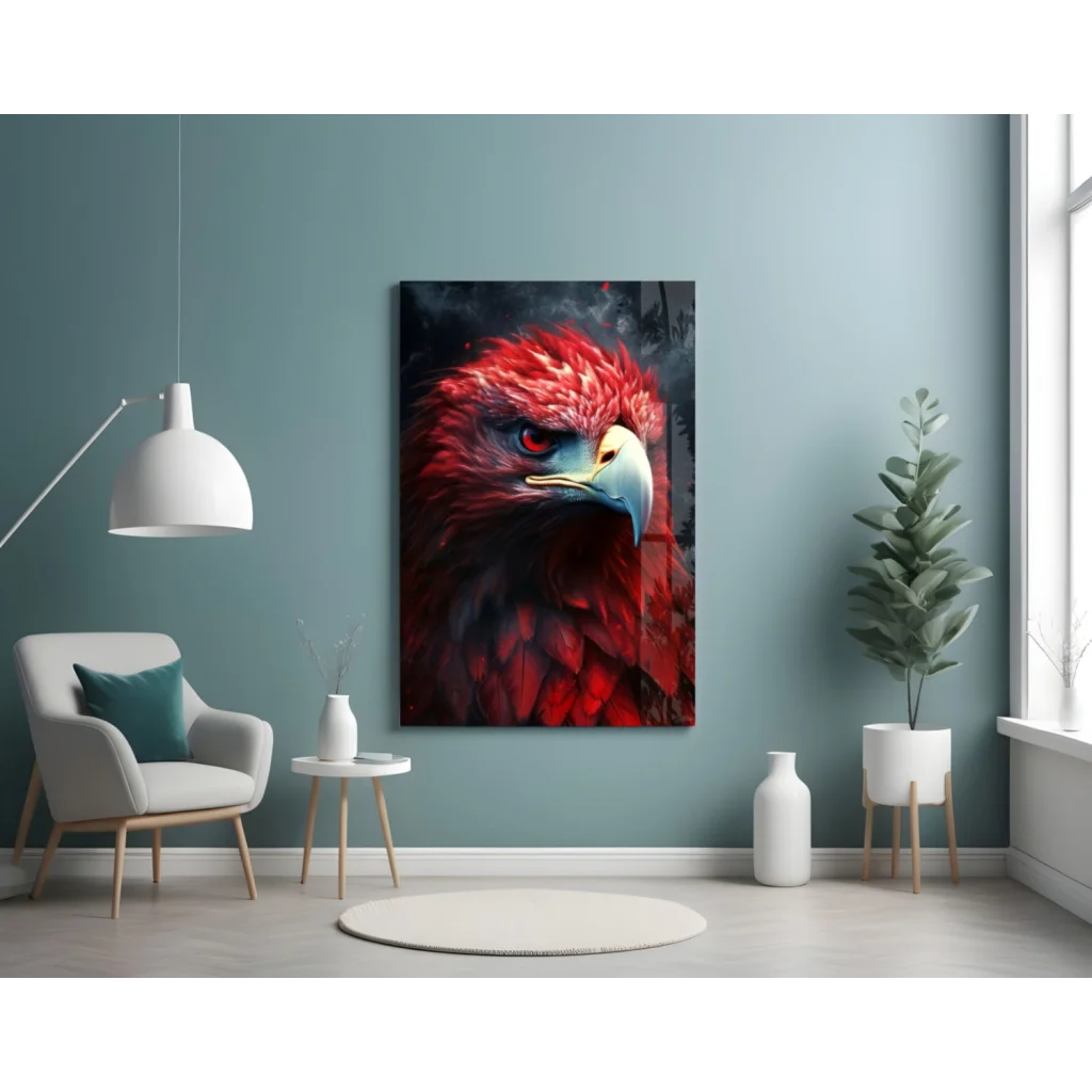 Fiery red eagle glass wall art with vibrant feathers and striking eye on teal wall
