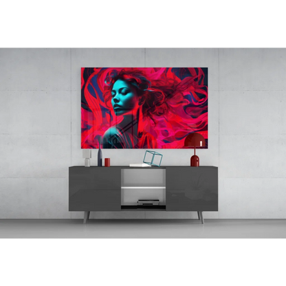 Vibrant abstract glass wall art print of woman with flowing red and blue hair on dark canvas