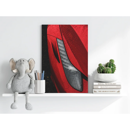 Red Ferrari canvas print with metallic carbon fiber accents on black background