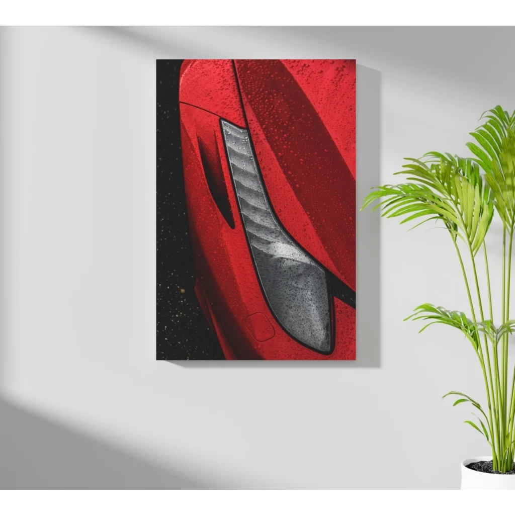 Red Ferrari canvas print with metallic carbon fiber accents on black textured background