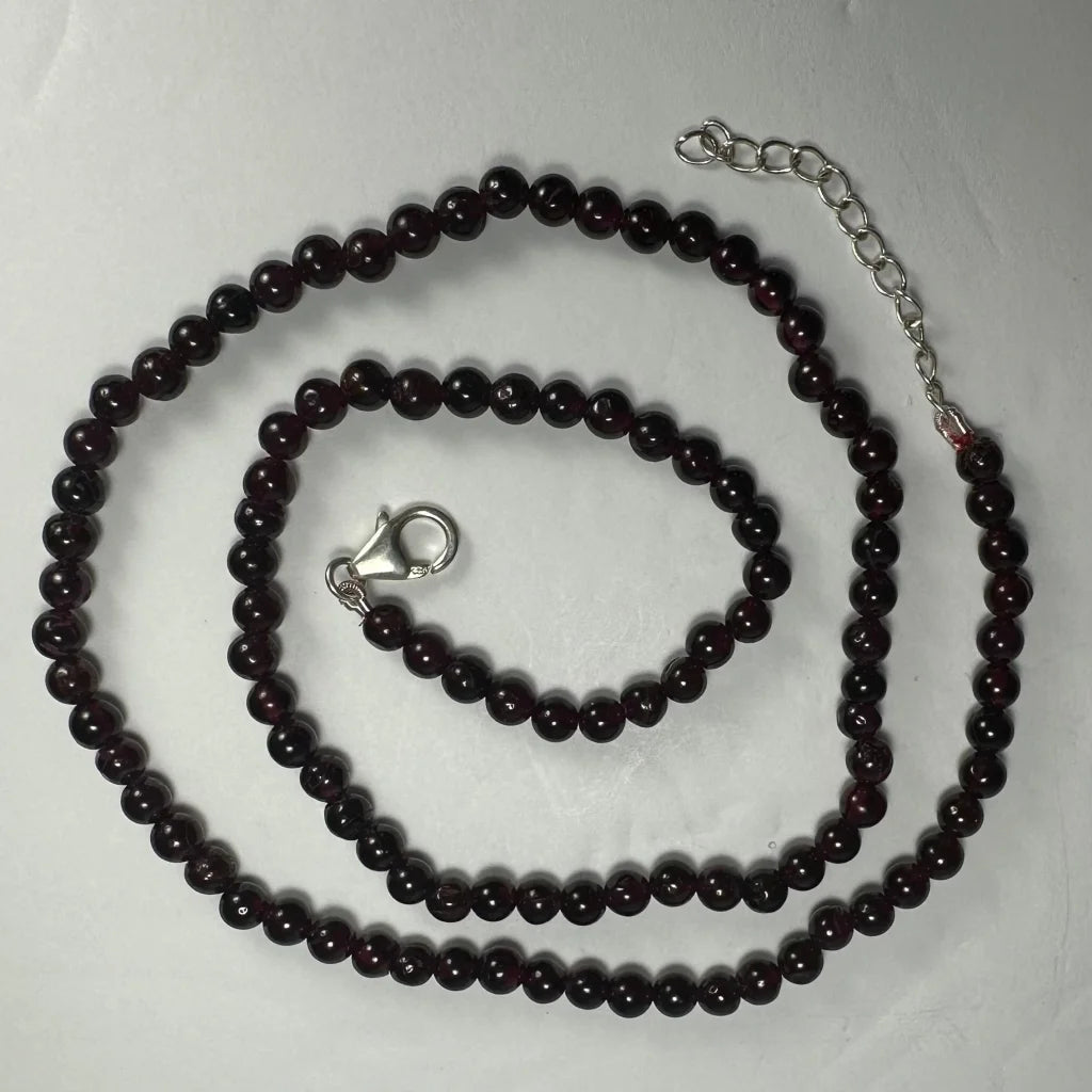 Red garnet round bead necklace with sterling silver chain and clasp