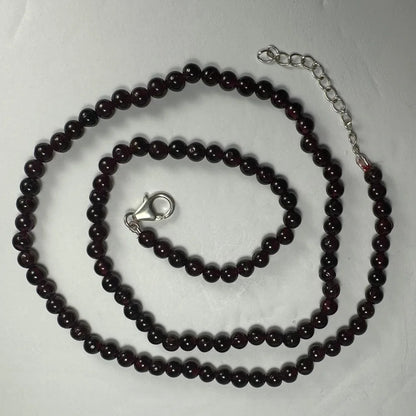 Red garnet round bead necklace with sterling silver chain and clasp