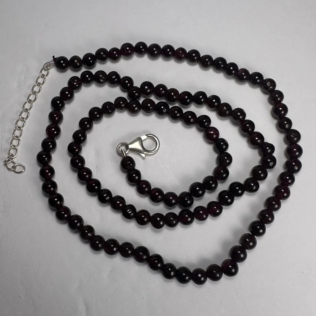 Red garnet round bead necklace with silver clasp