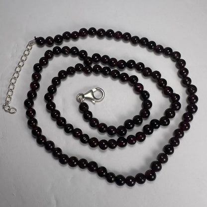 Red garnet round bead necklace with silver clasp