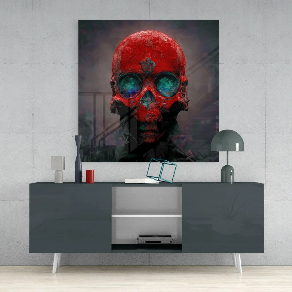 Striking red skull glass wall art with glowing blue eyes on gray table