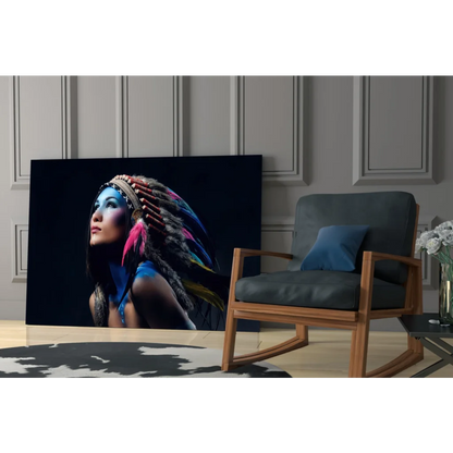 Vibrant woman in feathered headdress with blue face paint on glass wall art