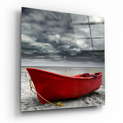 Red fiberglass rowboat with yellow rope on stormy beach glass wall art
