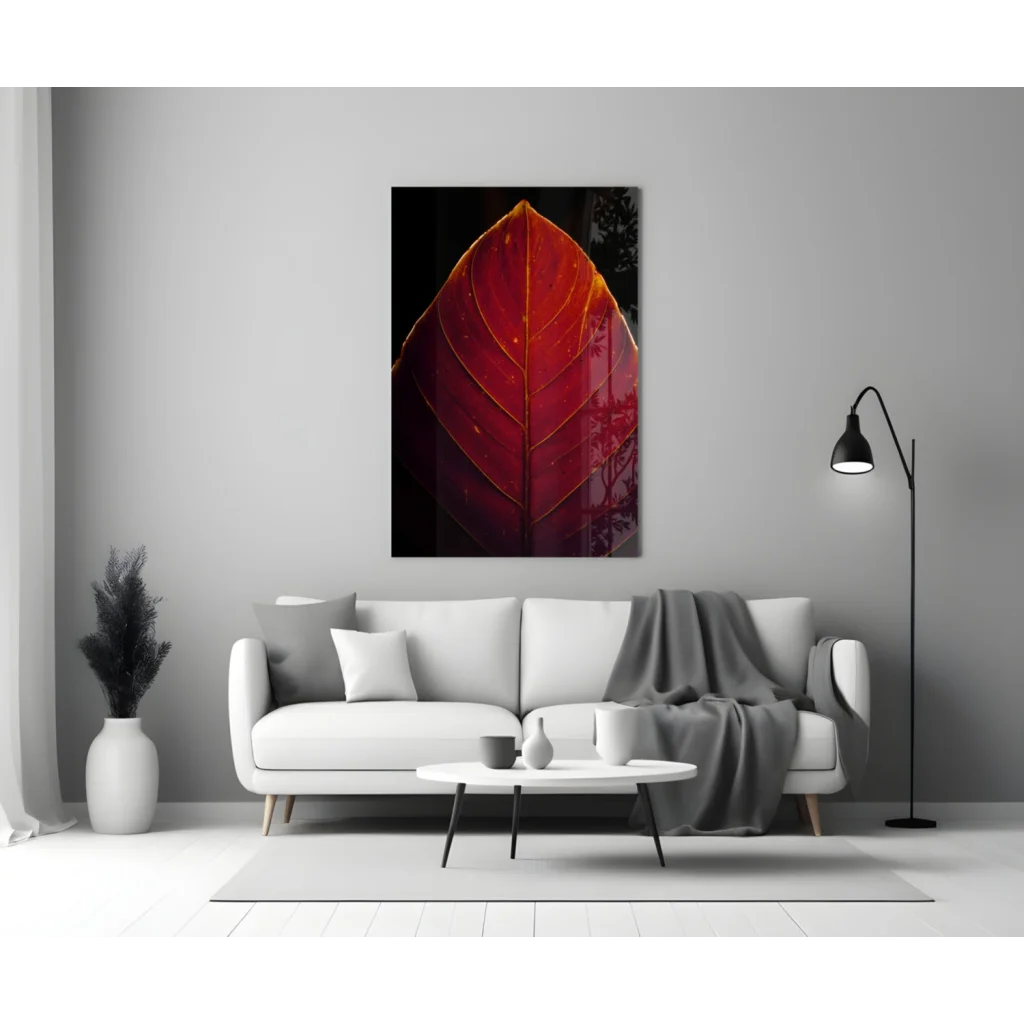 Stunning red leaf glass wall art with golden veins on gray wall