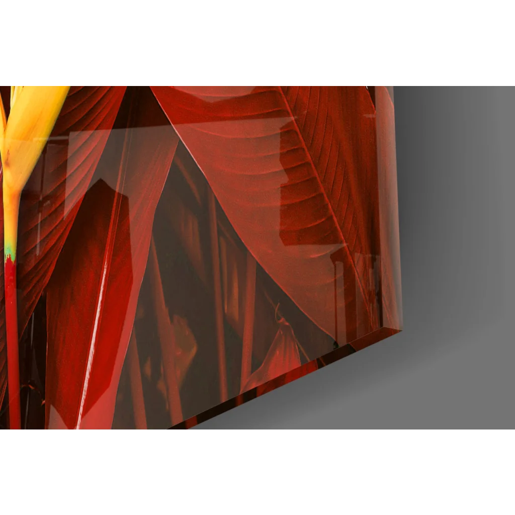 Translucent red glass wall art of tropical bird of paradise leaf with veining