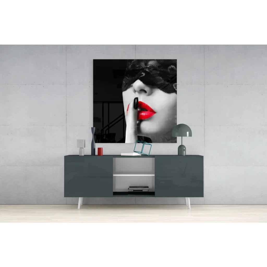Black-and-white woman portrait on glass wall art with red lips and lace mask