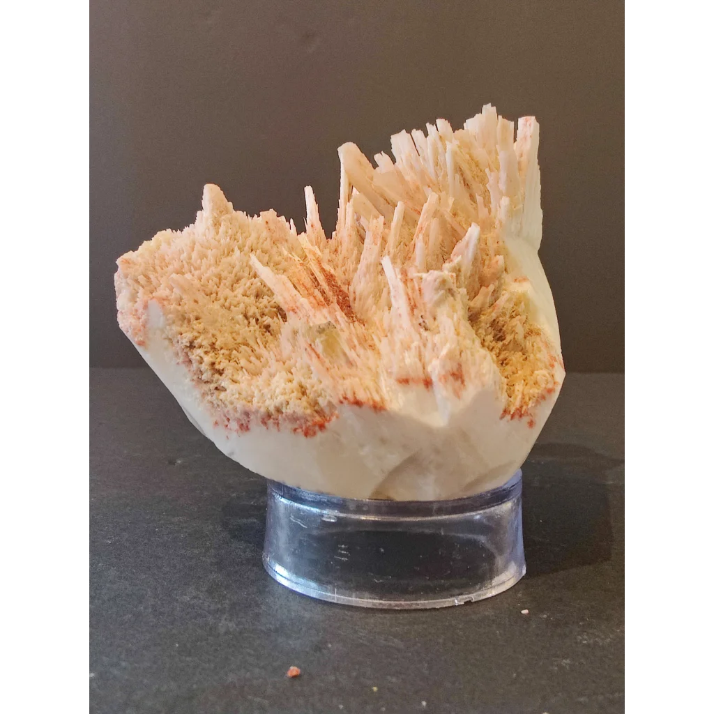 Red mordenite specimen 298g with sharp white and orange crystalline spikes