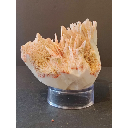 Red mordenite specimen 298g with sharp white and orange crystalline spikes