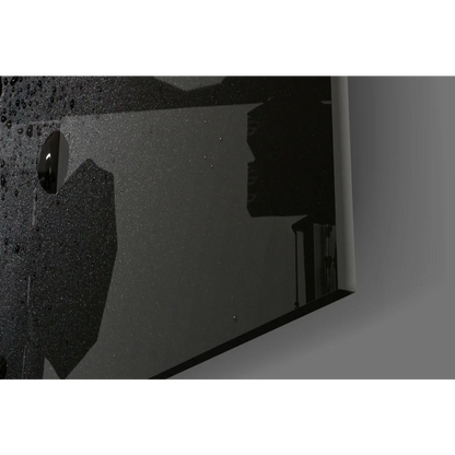 Black glossy glass wall art with speckled reflective mirror texture