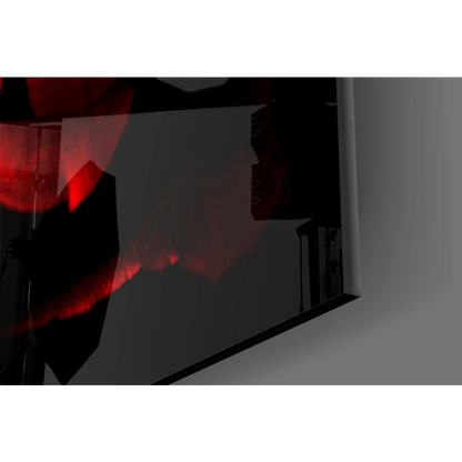 Sleek black frame monitor reflecting red rose wall art on dark gray screen