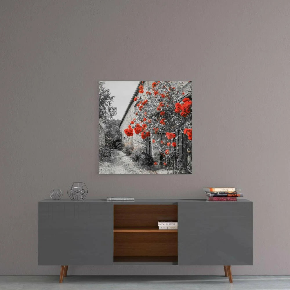 Vibrant red roses wall art print on stone pathway canvas