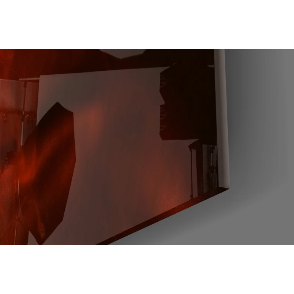 Sleek fiery red glass wall art with glossy angular edges and smoky drama