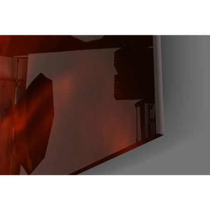 Sleek fiery red glass wall art with glossy angular edges and smoky drama