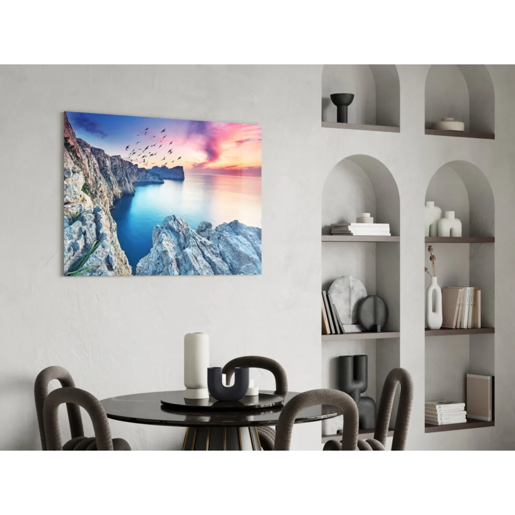 Vibrant coastal glass wall art with cliffs, sea, and sunset birds