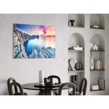 Vibrant coastal glass wall art with cliffs, sea, and sunset birds