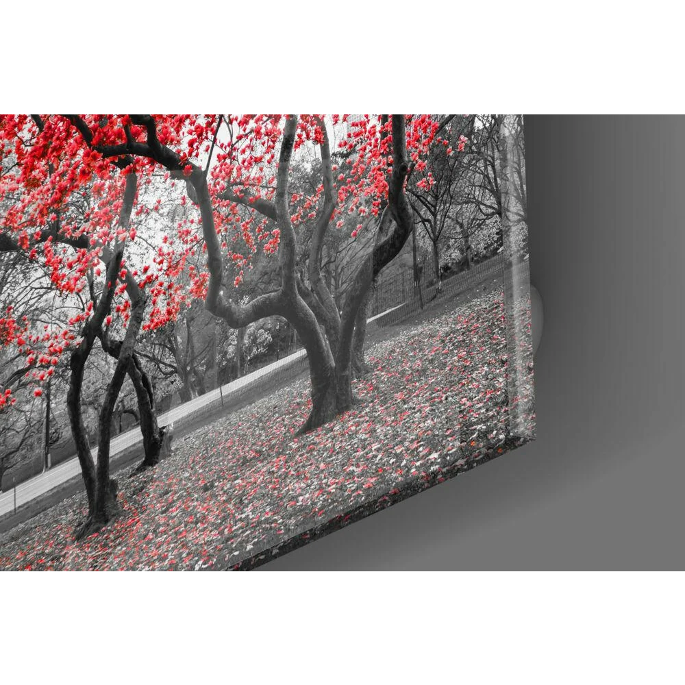 Vibrant red blossom glass wall art with glossy finish on canvas print