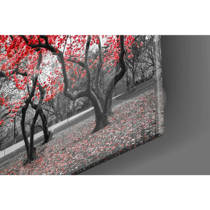 Vibrant red blossom glass wall art with glossy finish on canvas print
