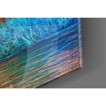 Vibrant fiery tree glass wall art with sunset blues, teals, purples