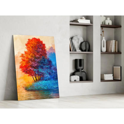 Fiery tree glass wall art with orange sunset hues on canvas