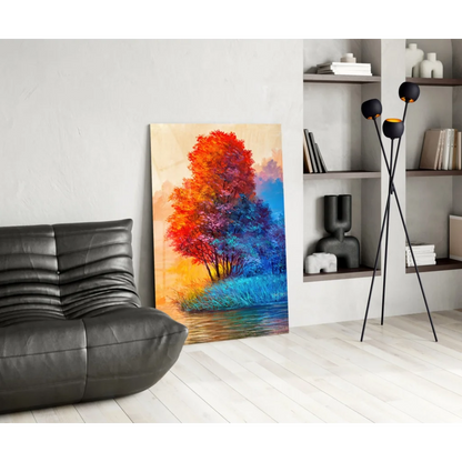 Vibrant fiery tree glass wall art in orange sunset hues on canvas