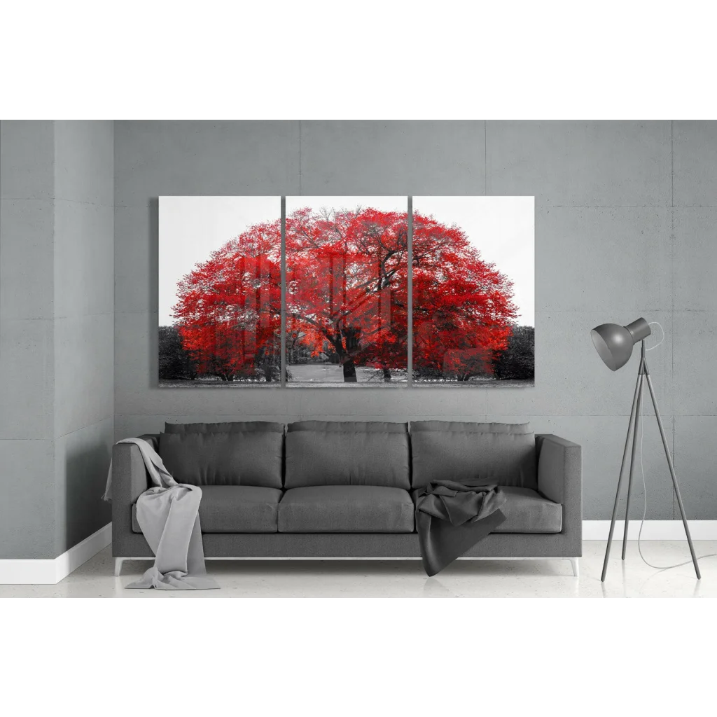 Vibrant red tree triptych wall art canvas print above gray sofa