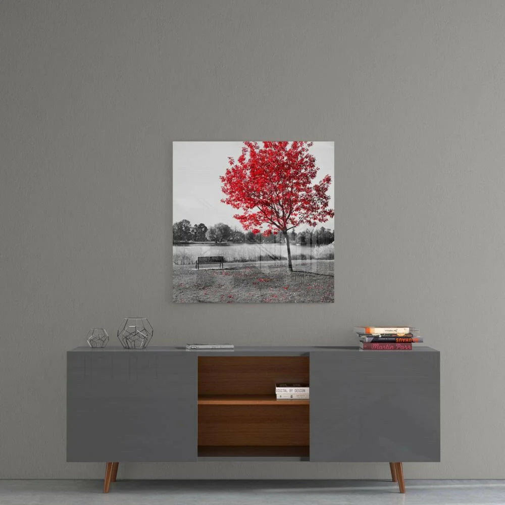 Vibrant red tree glass wall art on black-and-white landscape canvas