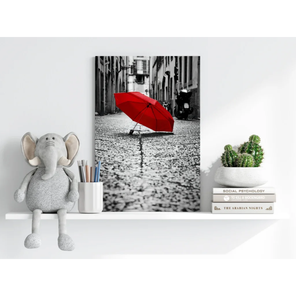 Vibrant red umbrella in black-and-white street scene on insigne aluminum print