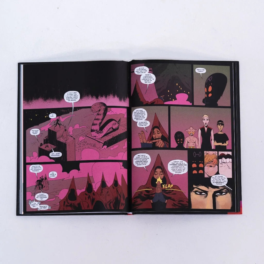 Open comic book with black and pink illustrations from the Relst Deluxe Edition with Self Defense Family Vinyl