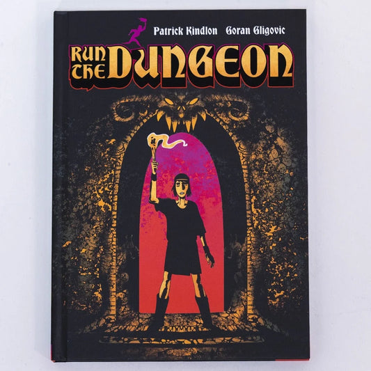 Graphic novel with black cover featuring a character holding a torch at a dungeon entrance for Relst’s Endless Dungeon Adventure Deluxe Edition defense family