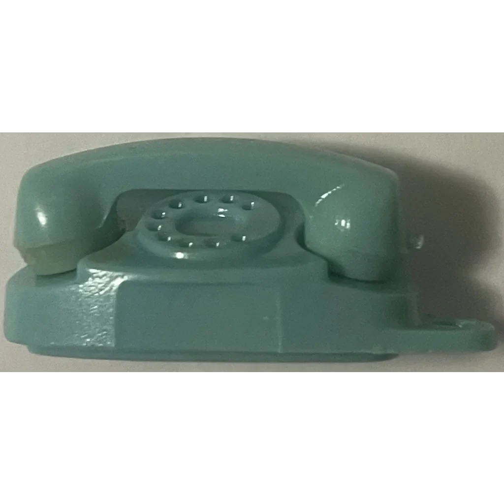 Vintage turquoise rotary phone keychain adds 1960s charm to your princess phones collection