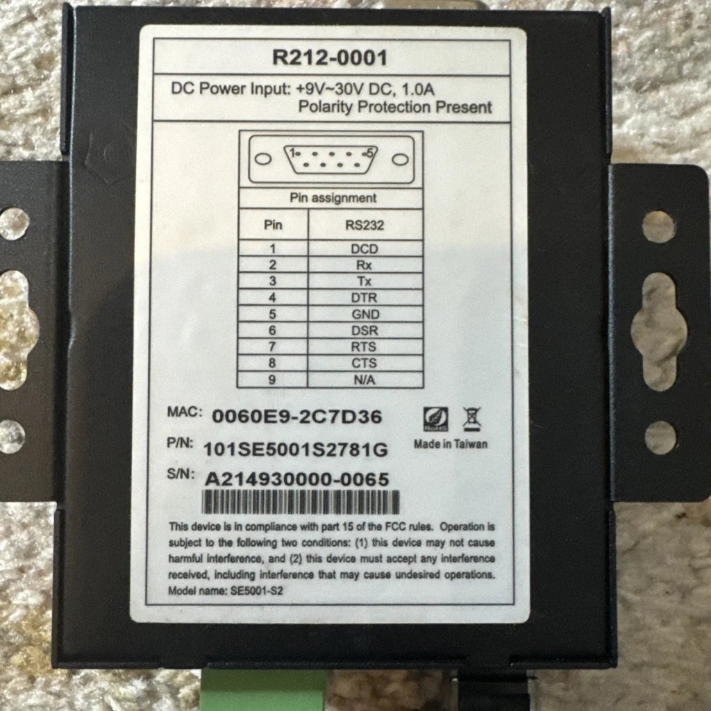 Back of Revel Serial Server R212-0001 with RS232 pin labels for POS barcode scanner