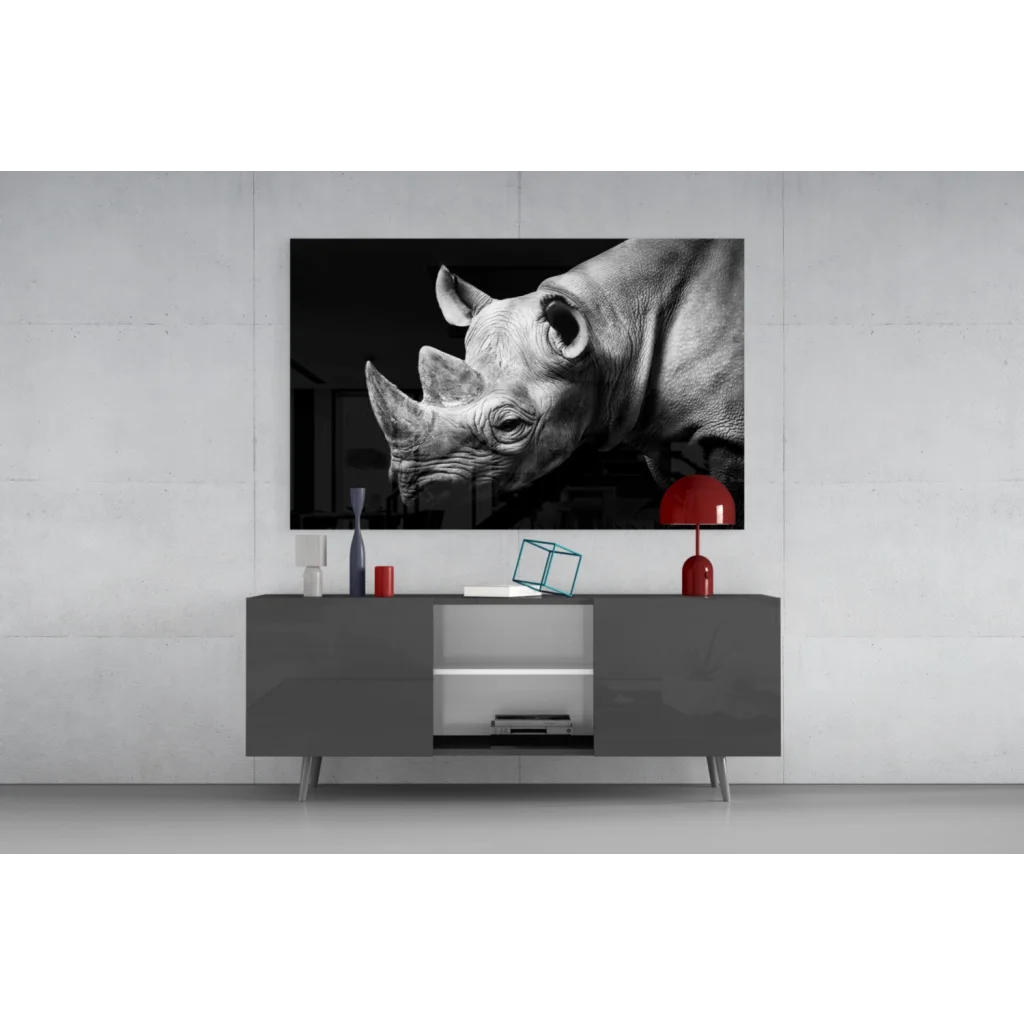 Majestic black-and-white rhino wall art canvas above gray console