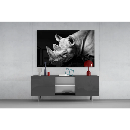 Majestic black-and-white rhino wall art canvas above gray console