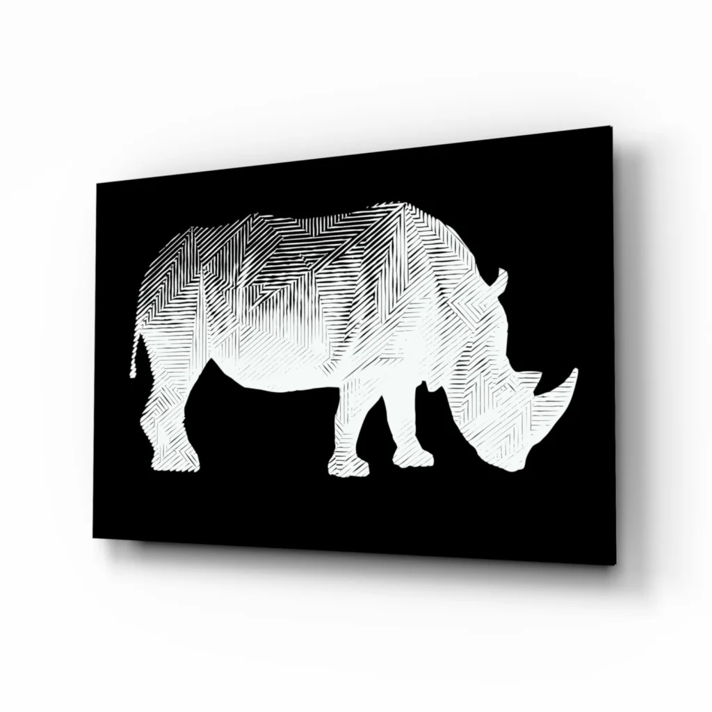 White rhino silhouette glass wall art with geometric patterns