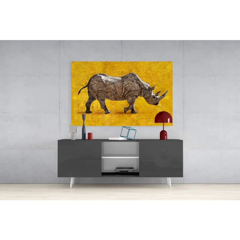 Textured gray rhino wall art on bold yellow background above console