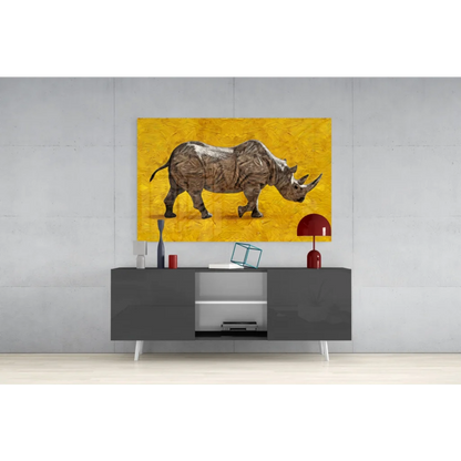 Textured gray rhino wall art on bold yellow background above console