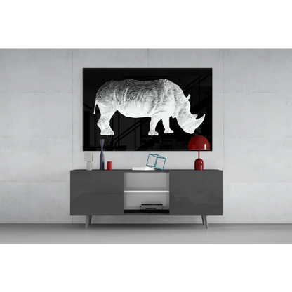 Black and white geometric rhinoceros glass wall art on glossy black canvas