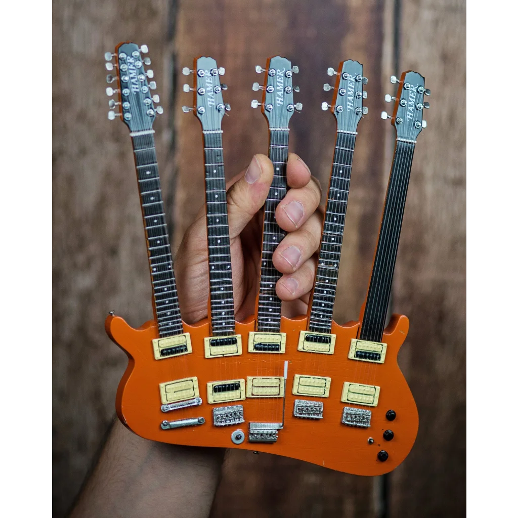 Orange Rick Nielsen officially licensed mini guitar by Axe Heaven®