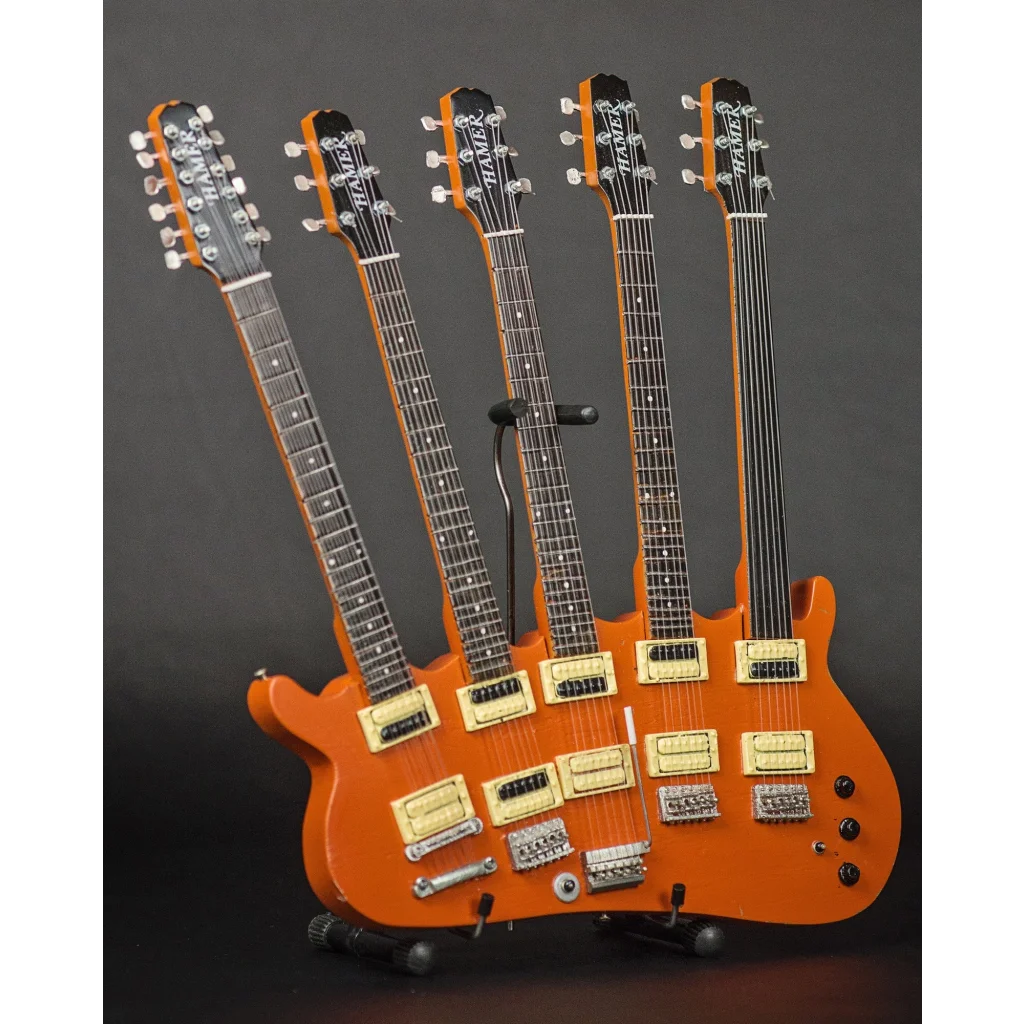 Rick Nielsen officially licensed mini guitar by Axe Heaven® in orange six-neck design