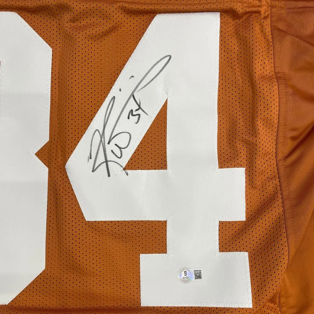 Ricky Williams autographed Texas Longhorns orange jersey with number 4