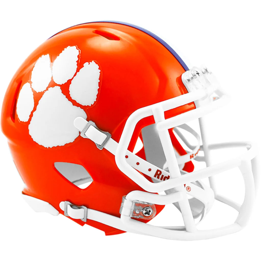 Riddell Speed Mini Helmet with orange white paw print design